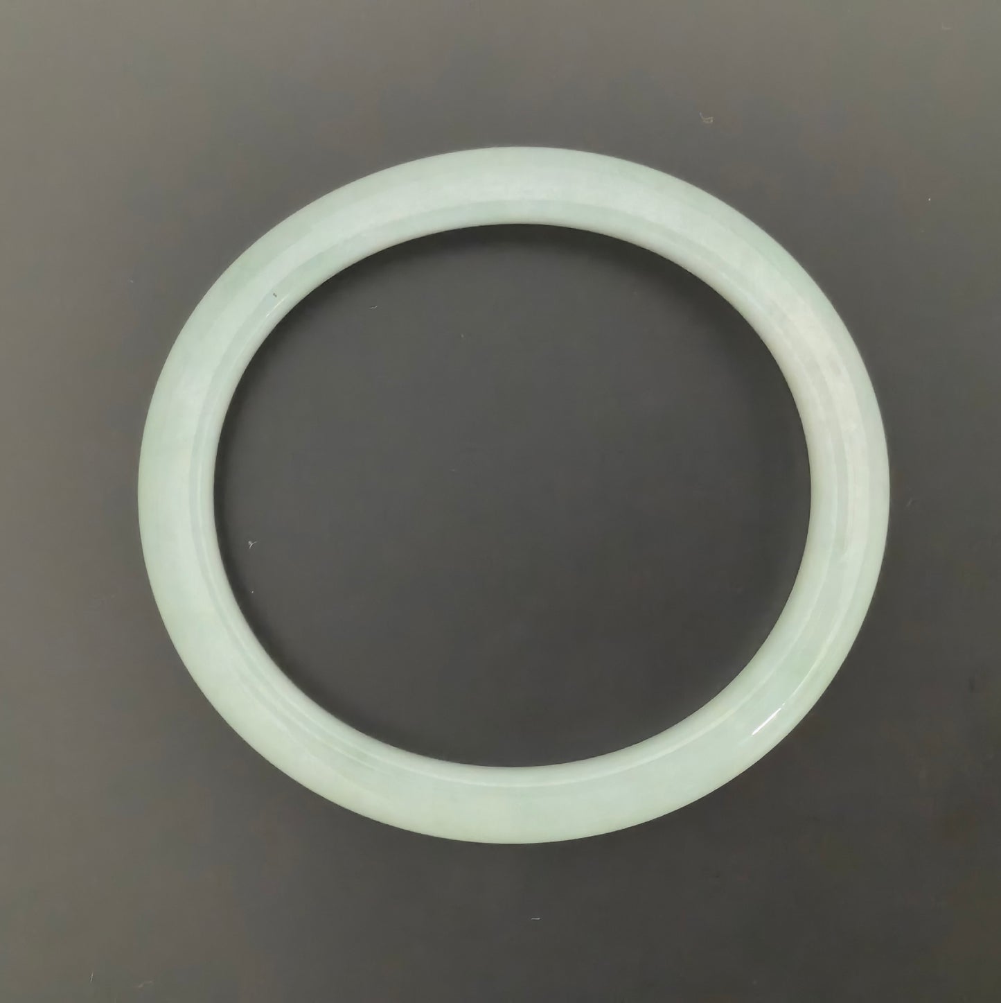Natural Grade-A Jadeite Oval Bangle – Pale Green Glutinous · Burmese Jade 51mm