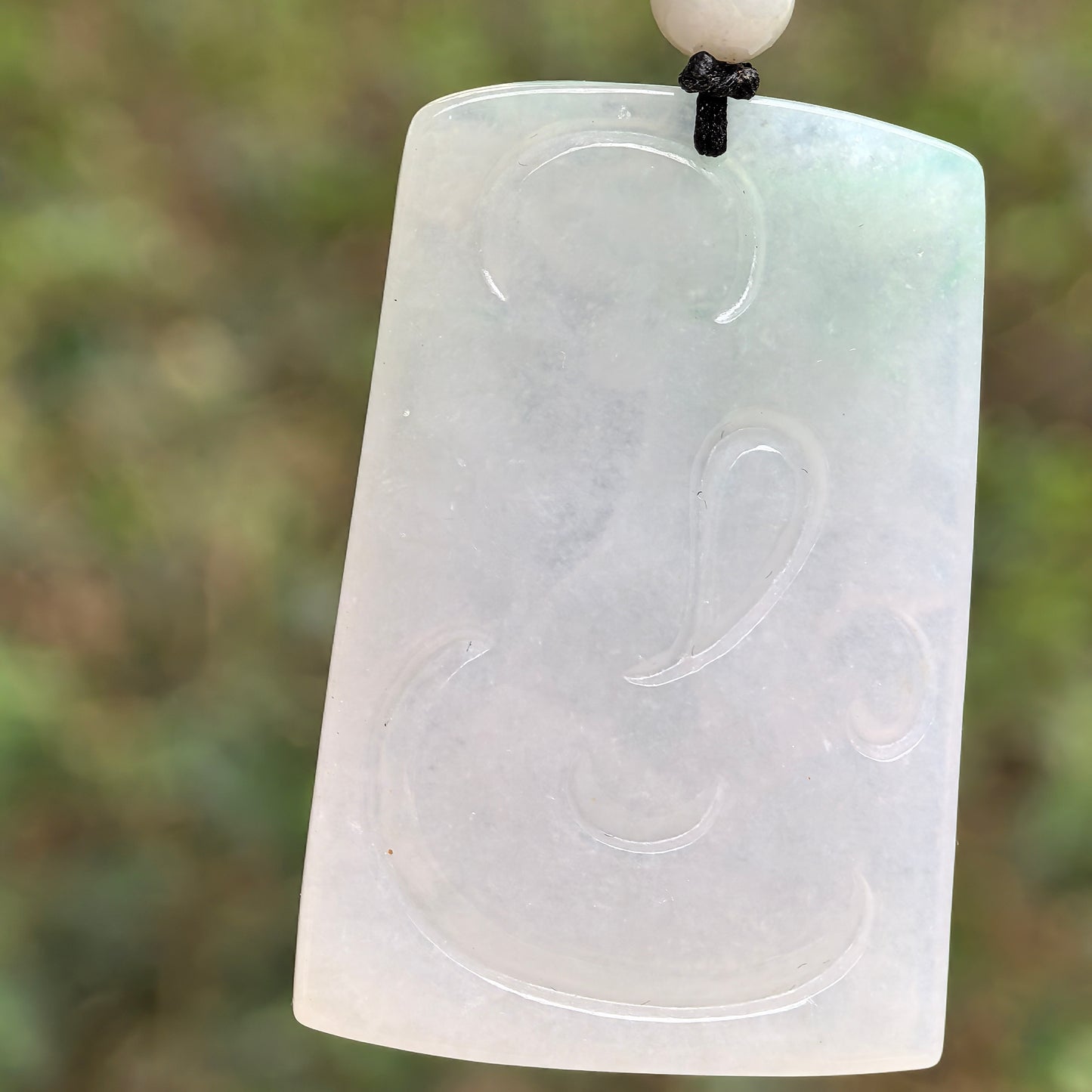 Natural Grade-A Jadeite Glutinous Icy Tiger Plaque Pendant with a Hint of Green · Burmese Jade