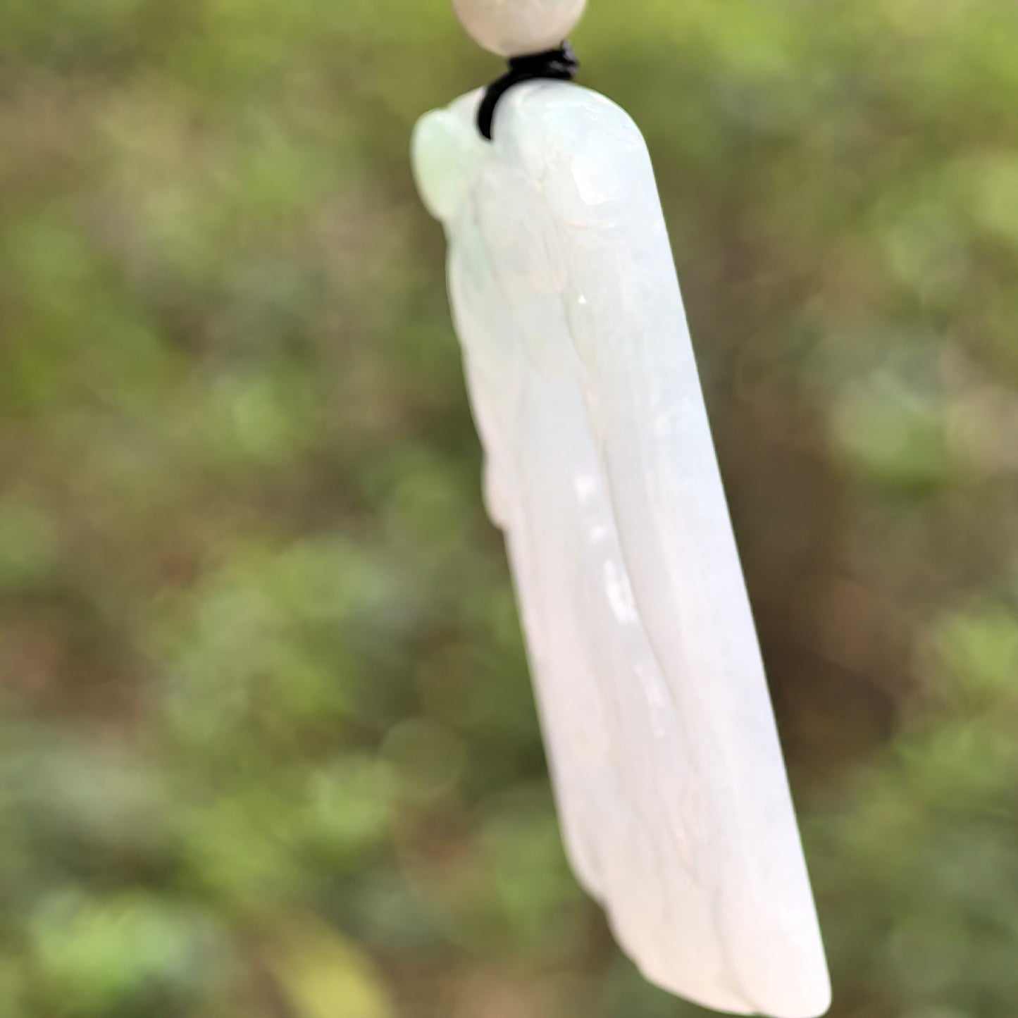 Natural Grade-A Jadeite Glutinous Icy Tiger Plaque Pendant with a Hint of Green · Burmese Jade